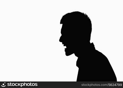 Silhouette of man screaming.