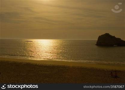 Silhouette of rock formation in the sea at dusk, Biarritz, Basque Country, Pyrenees-Atlantiques, Aquitaine, France