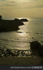 Silhouette of rocks in the ocean, Baie de Biarritz, Biarritz, France