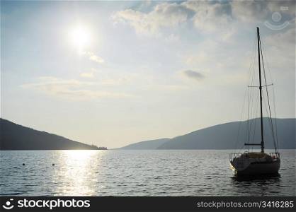 Silhouette of sail boat in the sea. Herceg Novi, Montenegro