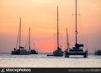 silhouette of sail boat on sea at sunset ,phuket,thailand