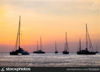 silhouette of sail boat on sea at sunset ,phuket,thailand