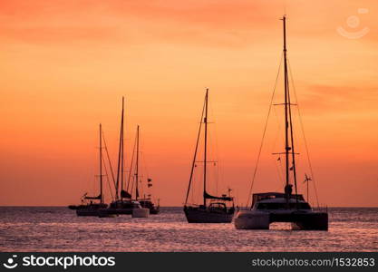 silhouette of sail boat on sea at sunset ,phuket,thailand