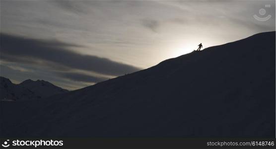 Silhouette of skier on mountain, Kicking Horse Mountain Resort, Golden, British Columbia, Canada