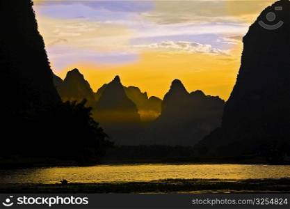 Silhouette of the rocks at the riverside, Li River, XingPing, Yangshuo, Guangxi Province, China