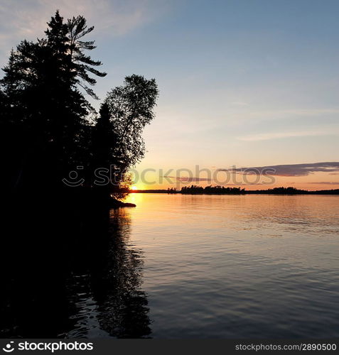 Silhouette of trees at the lakeside, Lake of the Woods, Ontario, Canada