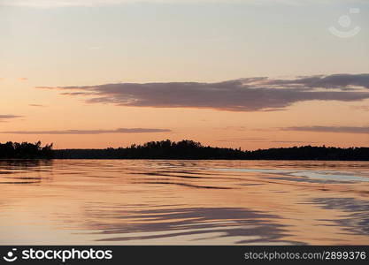 Silhouette of trees at the lakeside, Lake of the Woods, Ontario, Canada