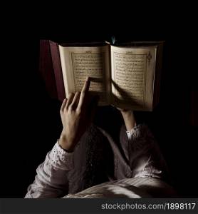 silhouette woman reading quran. Resolution and high quality beautiful photo. silhouette woman reading quran. High quality beautiful photo concept