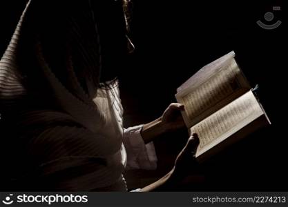 silhouette woman reading quran2. Resolution and high quality beautiful photo. silhouette woman reading quran2. High quality beautiful photo concept