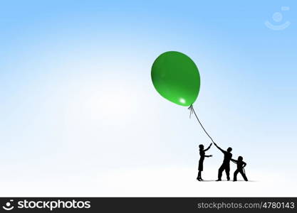 Silhouettes of people. Little silhouettes of people pulling rope with balloon