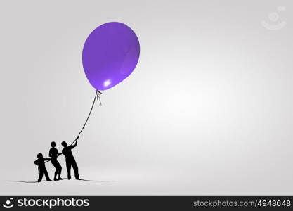 Silhouettes of people. Little silhouettes of people pulling rope with balloon