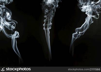 silhouettes smoke with spiral shapes
