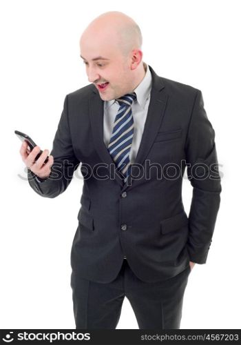 Silly businessman surprised with a cellphone. Isolated on white background