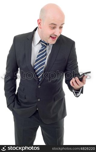 Silly businessman surprised with a cellphone. Isolated on white background