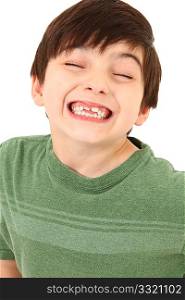 Silly smile on an adorable seven year old french american boy over white.
