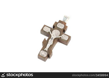 silver and wooden cross with religious inscriptions isolated on a white