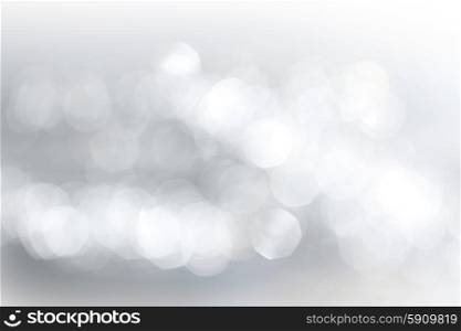 Silver bokeh abstract light holiday background. Silver bokeh light background