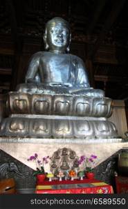 Silver Buddha statue in Jingan temple in Shanghai, China
