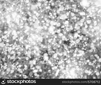 Silver Christmas background with bokeh lights