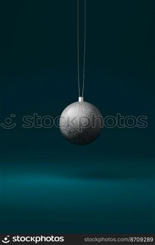 Silver Christmas tree bauble isolated on a dark blue background. 3d render