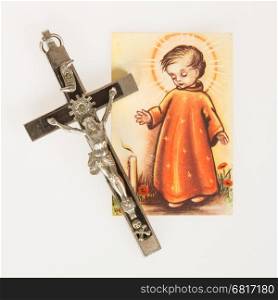 Silver cross and old holy bible, isolated