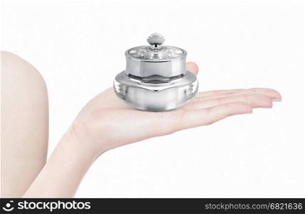 Silver deluxe cosmetic jar on hand isolated