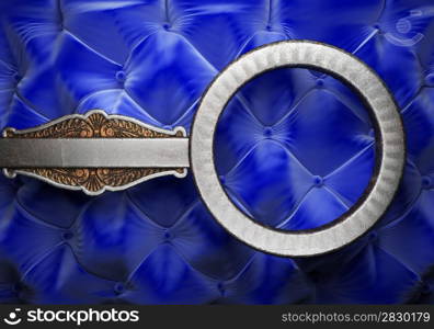 Silver element on fabric background