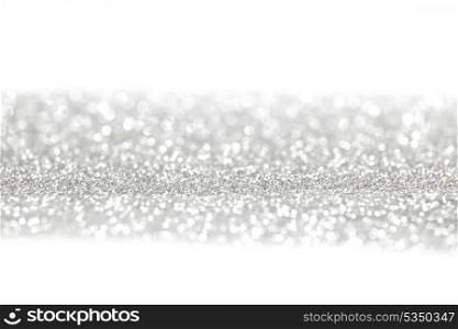 Silver glitter background with white copy space
