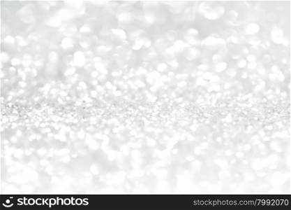 Silver glitter with copy space. Silver defocused glitter background with text space