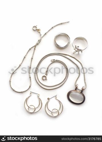 Silver jewelry on white background