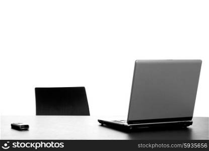 silver laptop with mouse on a office desk