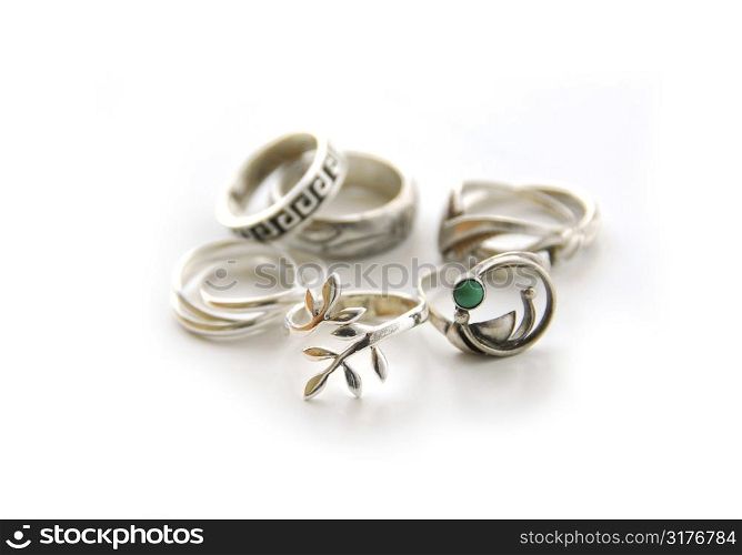 Silver rings on white background