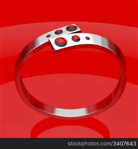 Silver ruby ring on shiny red background