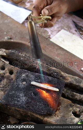 Silver work with flame, Sumatra