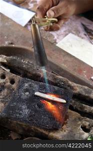 Silver work with flame, Sumatra