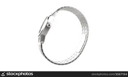 Silver wristwatch rotates on white background