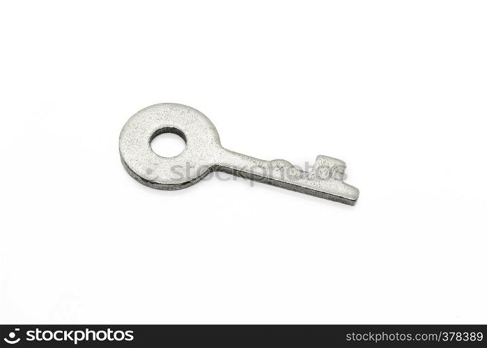 Simple metallic key isolated on white background