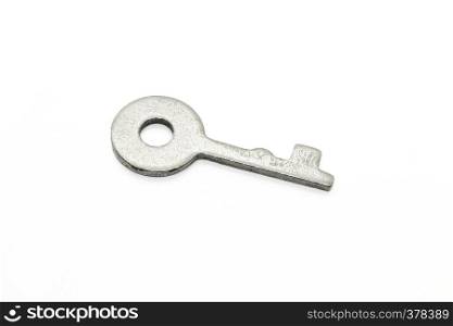 Simple metallic key isolated on white background