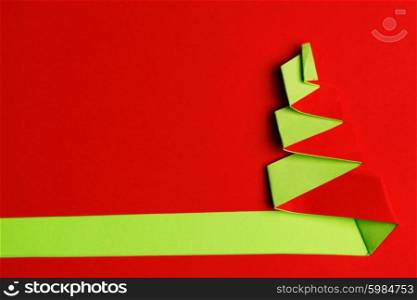 Simple paper christmas tree background with copy space