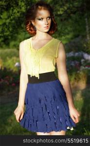 Simplicity. Young Red Hair Woman in Blue Skirt Looking Away