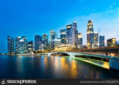 Singapore business district skyline in the evening.. Singapore business district skyline.