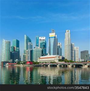 Singapore business district skyscrapers and Marina Bay in day