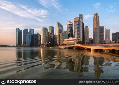 Singapore central business district skyline, blue sky and morning sunrise at marina bay. Singapore city skyline. Singapore cityscape.
