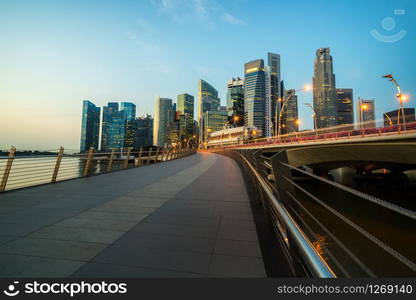 Singapore central financial district skyline at blue hour from marina bay. Singapore cityscape, night skyline, city. Singapore Marina bay is landmark, tourist destination and city center of Singapore.