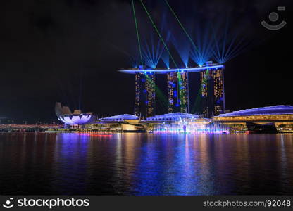 Singapore city at night with beautiful laser show