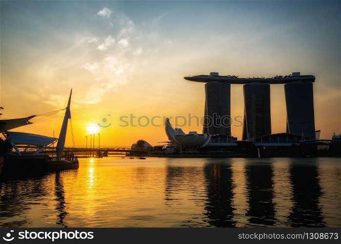 Singapore city, SINGAPORE - FEBRUARY 10, 2017 : Marina Bay Sands Hotel, Landmark of Singapore during morning sunrise at Marina Bay, Singapore.