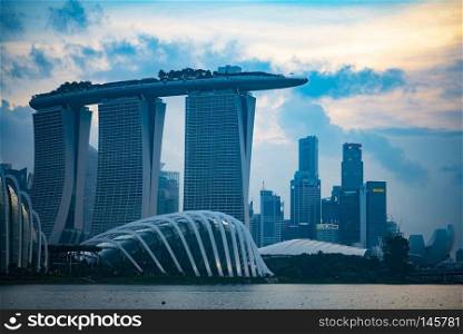 Singapore cityscape at dusk. Landscape of Singapore business modern building around Marina bay at twilight, Singapore - 11 July 2018