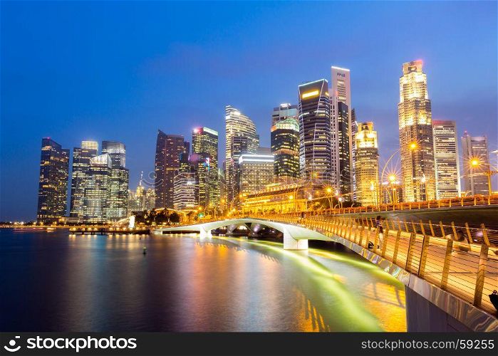 Singapore downtown cityscape with modern skyline and city skyscraper sunset at Marina Bay