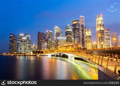 Singapore downtown cityscape with modern skyline and city skyscraper sunset at Marina Bay
