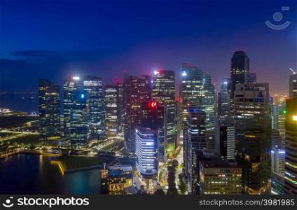 SINGAPORE - FEBRUARY 3: Aerial view Singapore business district and city, Marina Bay is bay located in the Central Area of Singapore on February 3, 2020 in Singapore.. Travel Holiday in Singapore.